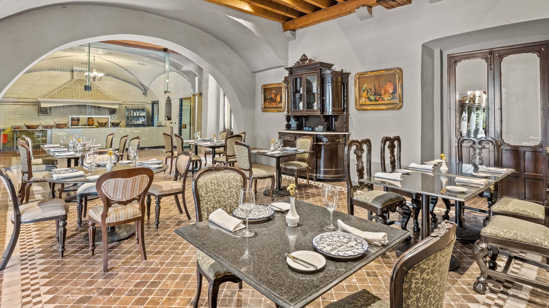 Historic vaulted Tierra Mia with stone arches and classic furniture at the Quinta Real Puebla