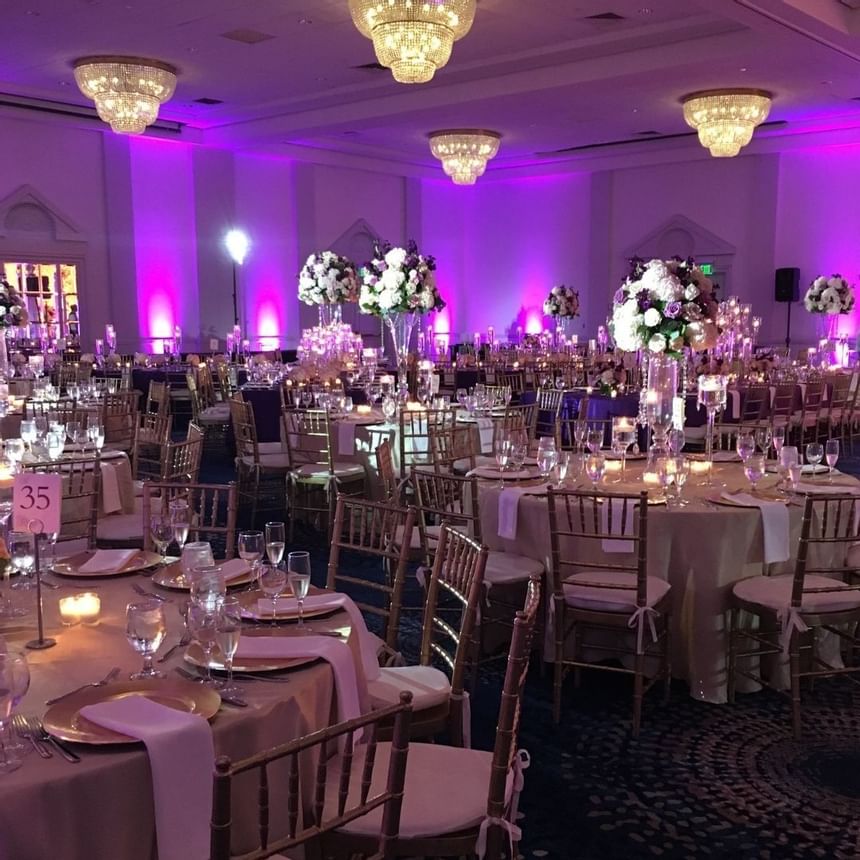 Table set-up for Ballroom with purple light, Ocean Place Resort