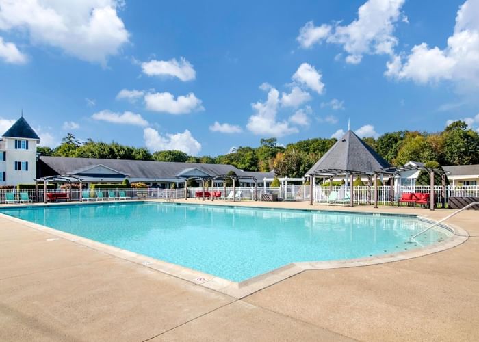 Outdoor pool and sky view on a sunny day at Ogunquit Collection