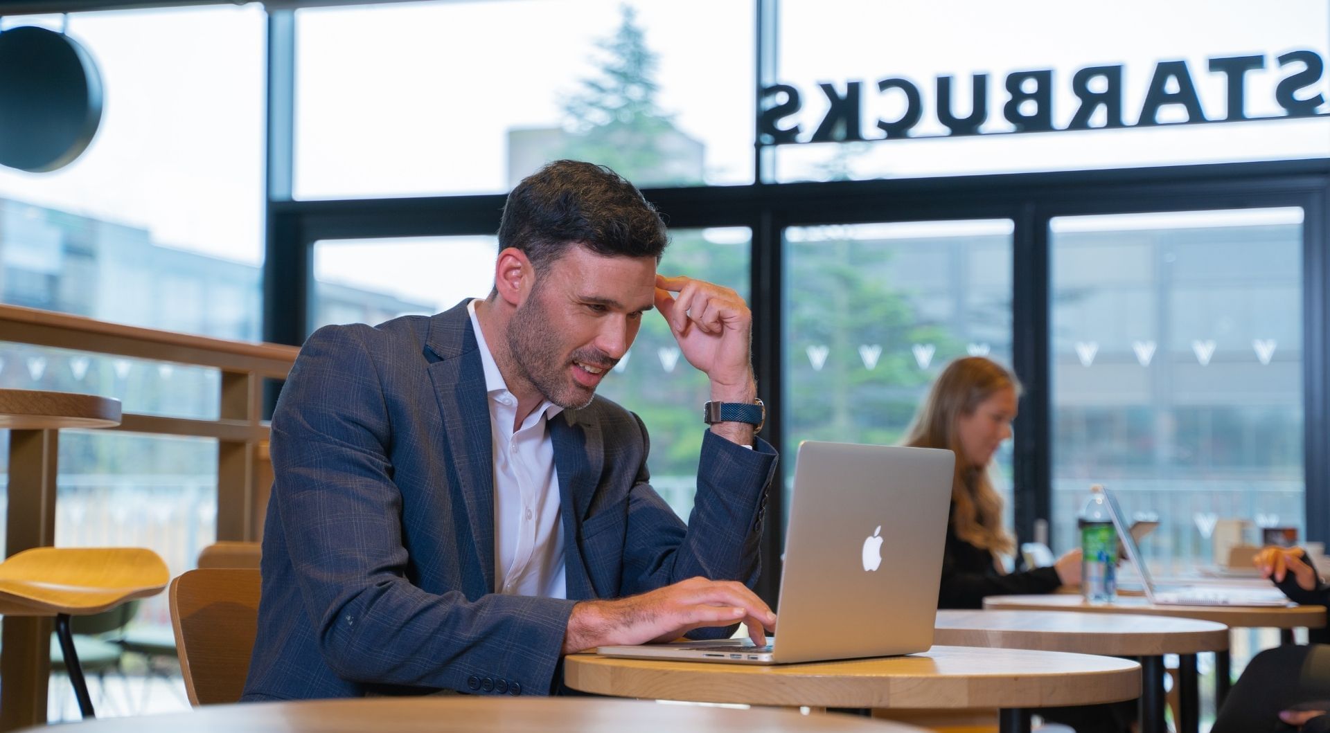 Man working in a business center at Village Bracknell