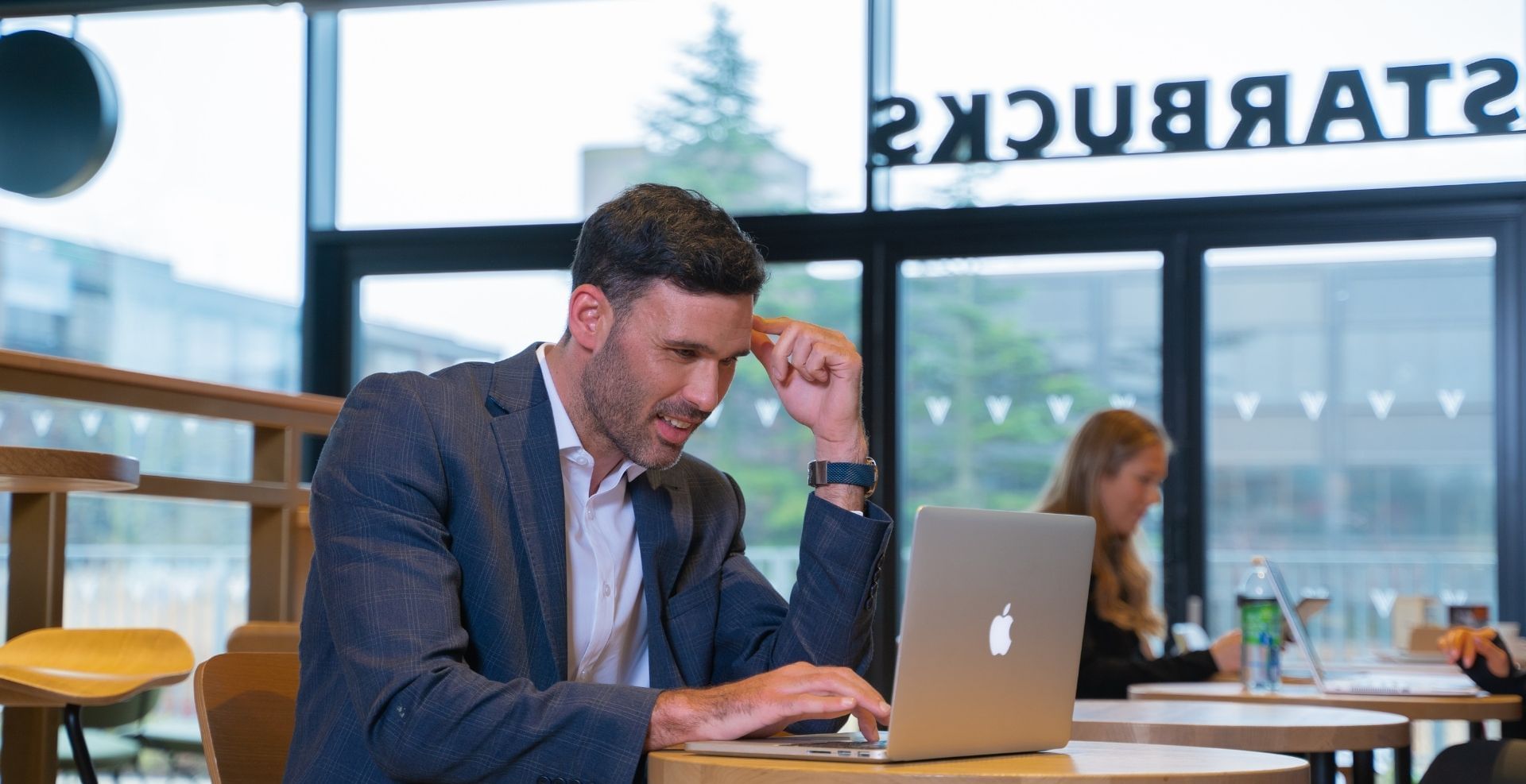Close up of a guy working in Starbucks near Farnborough