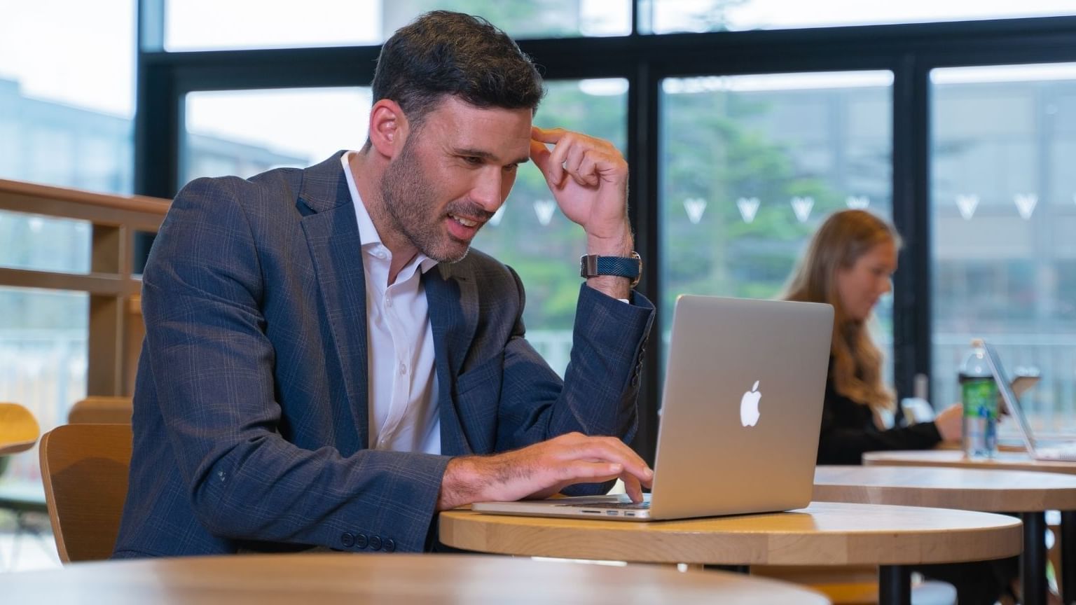 A businessman working on the laptop at Village Hotels