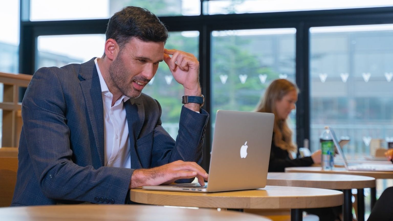 A man working in a Starbucks at Village Hotel Edinburgh