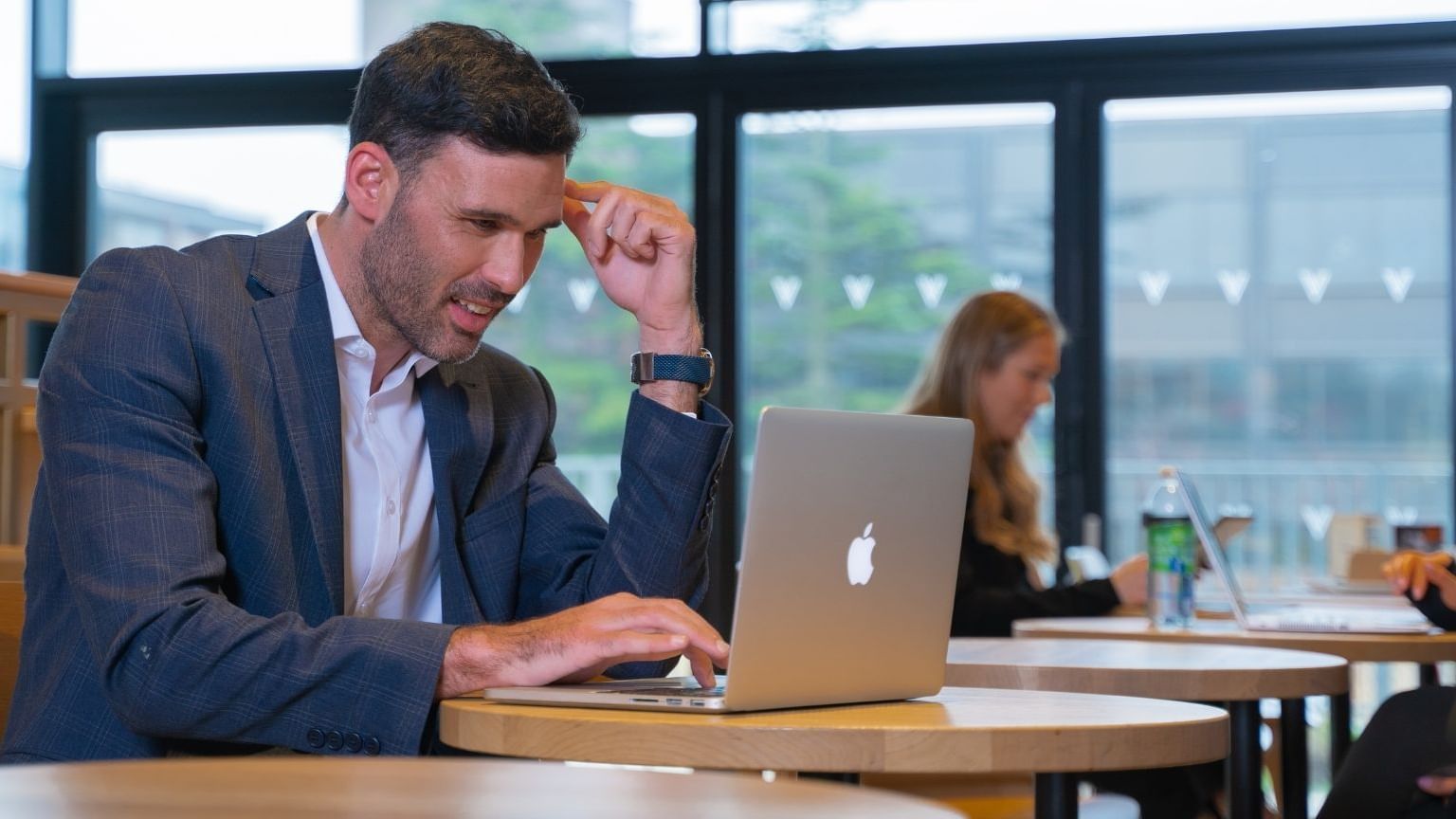 A man working in a Starbucks at Village Hotel Edinburgh