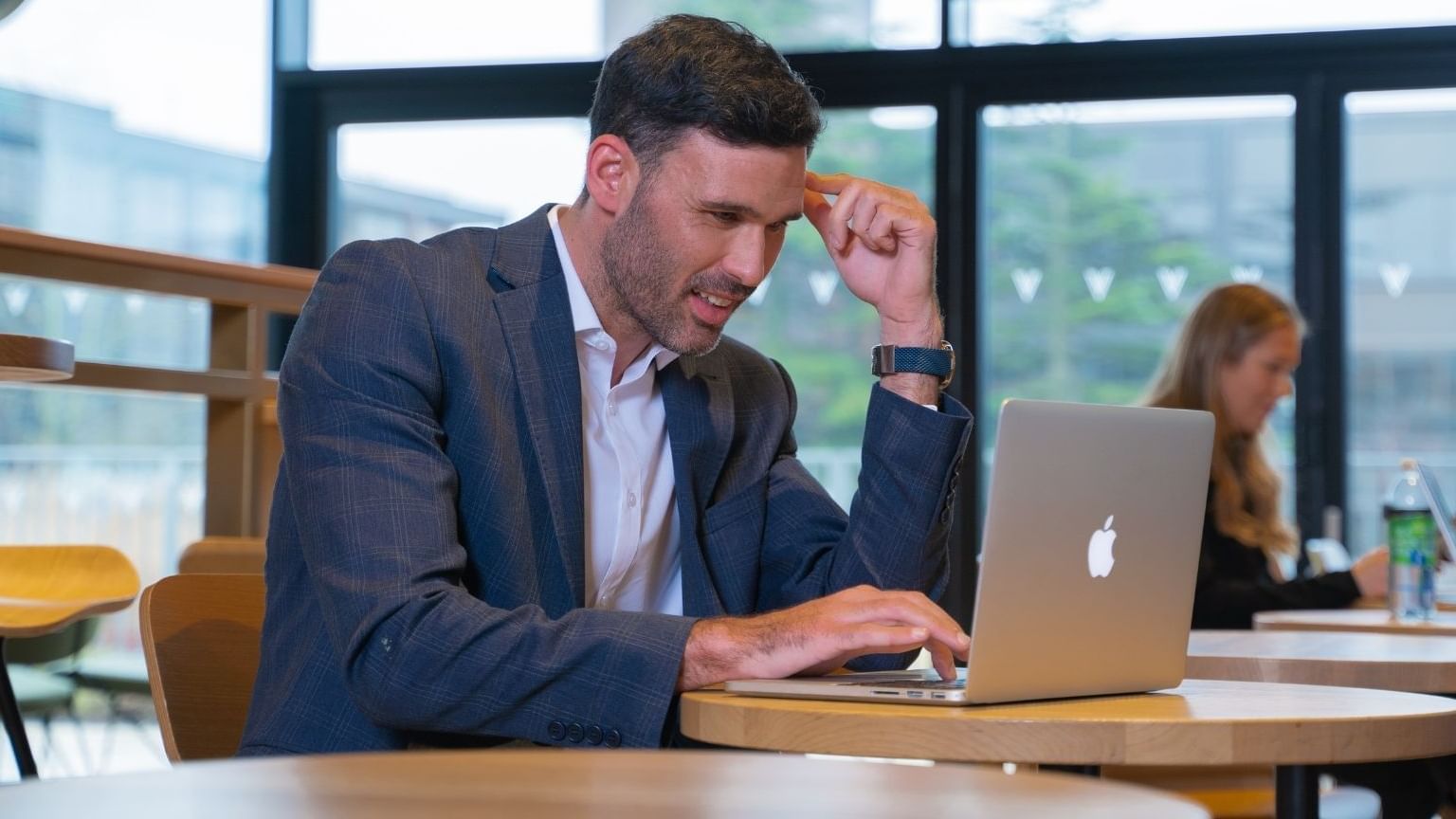 A man working in a Starbucks at Village Hotel Aberdeen