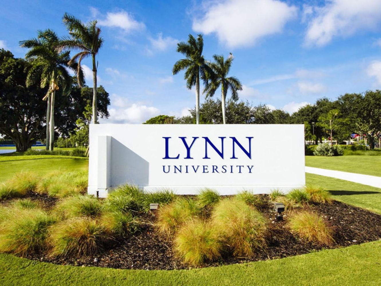 University logo presented by the entrance of Lynn University near Ocean Lodge Boca Raton
