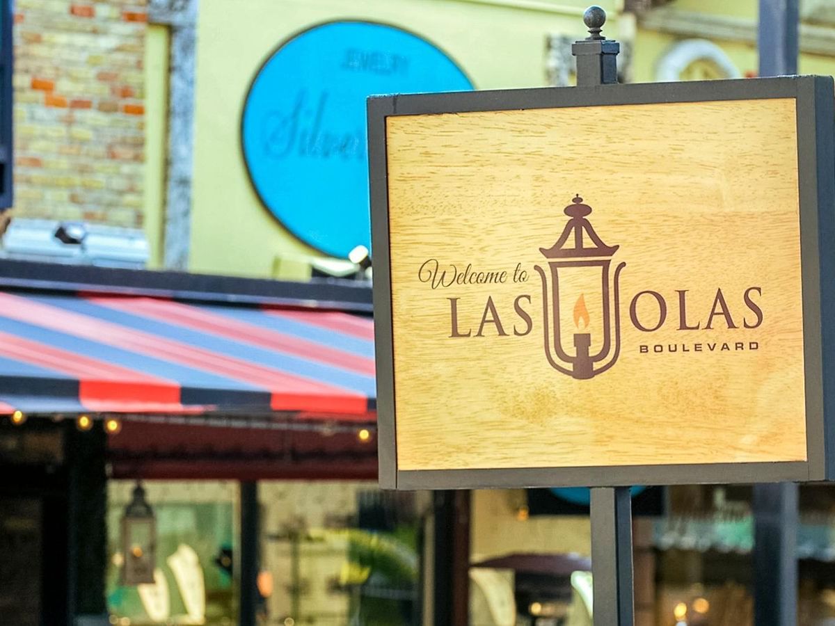 sign that says welcome to las olas boulevard