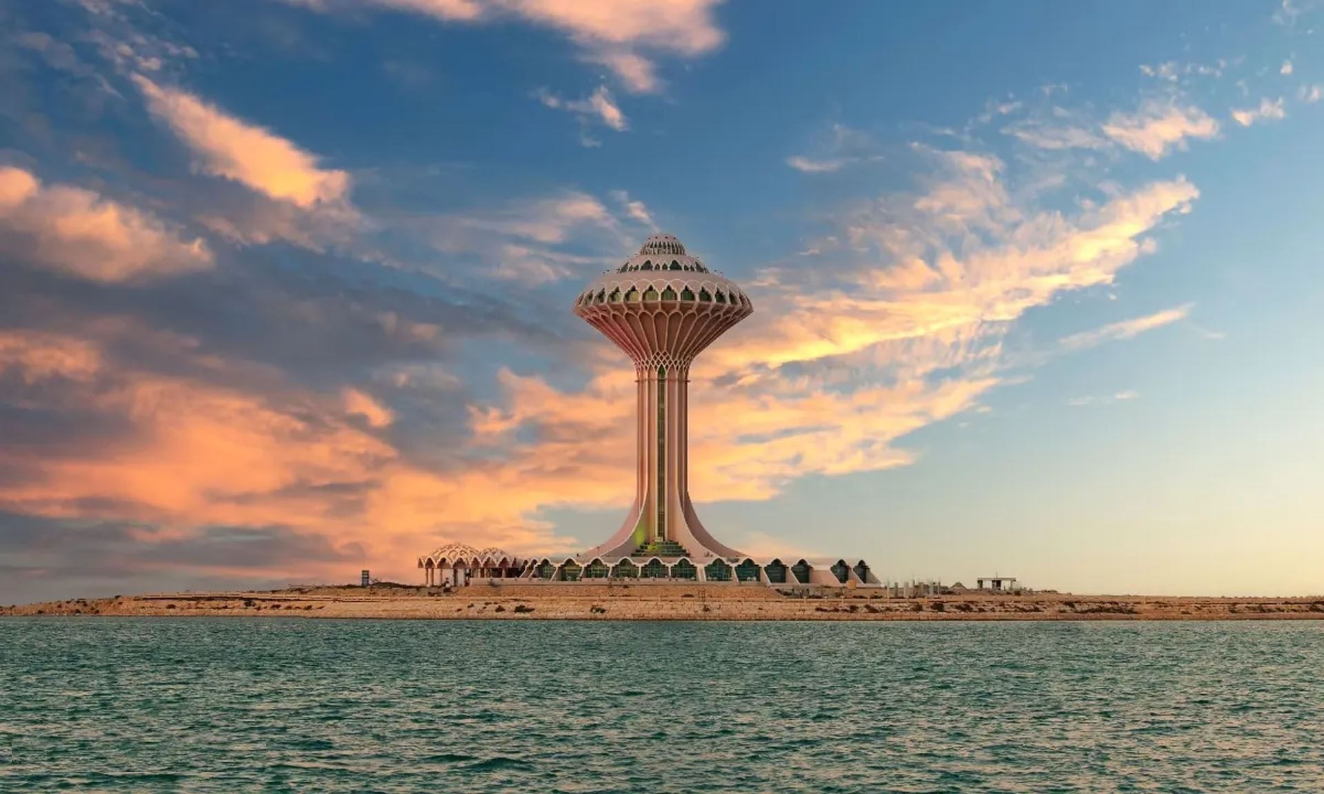 Al Khobar Water Tower with a unique conical top surrounded by water near Warwick Al Khobar