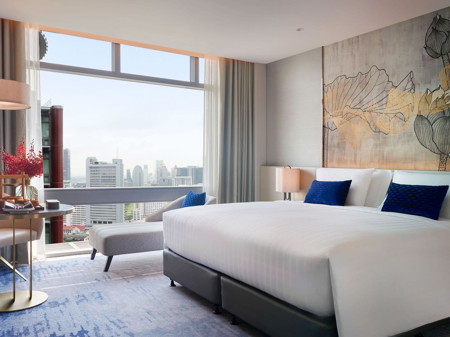 Large bed, art & city view, Suite at Chatrium Grand Bangkok