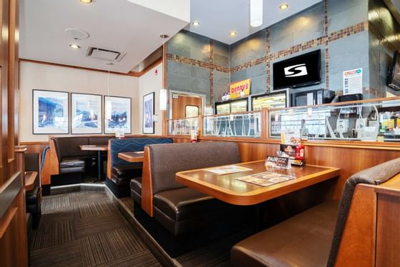 dining room seating at dennys in the sandman hotel in west calgary