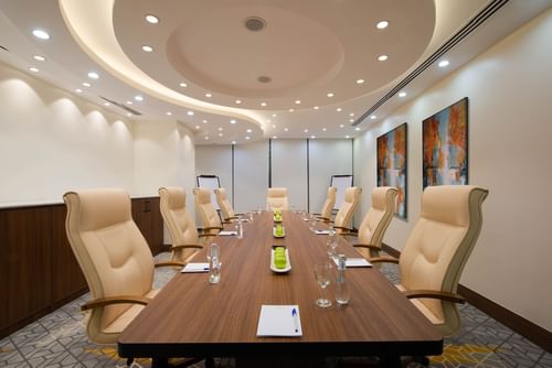 Meeting Room with an arranged table at Warwick Riyadh