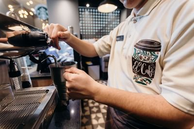Close-up of a barista making coffee, El Cafe, Araiza San Luis