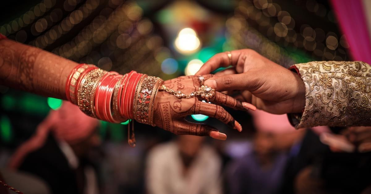 ring exchange at a Pakistani wedding at Eatshampstead Park in Berkshire