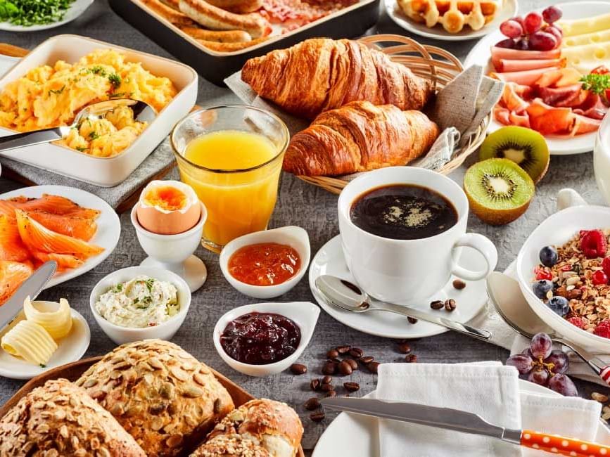assortment of breakfast food items on table