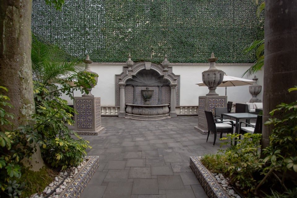 Outdoor area with tables at Curamoria Collection