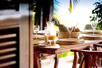 Dining table with tropical accoutrements