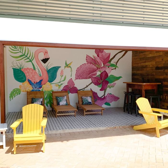 Patio with wooden loungers at Novotel Darwin Airport