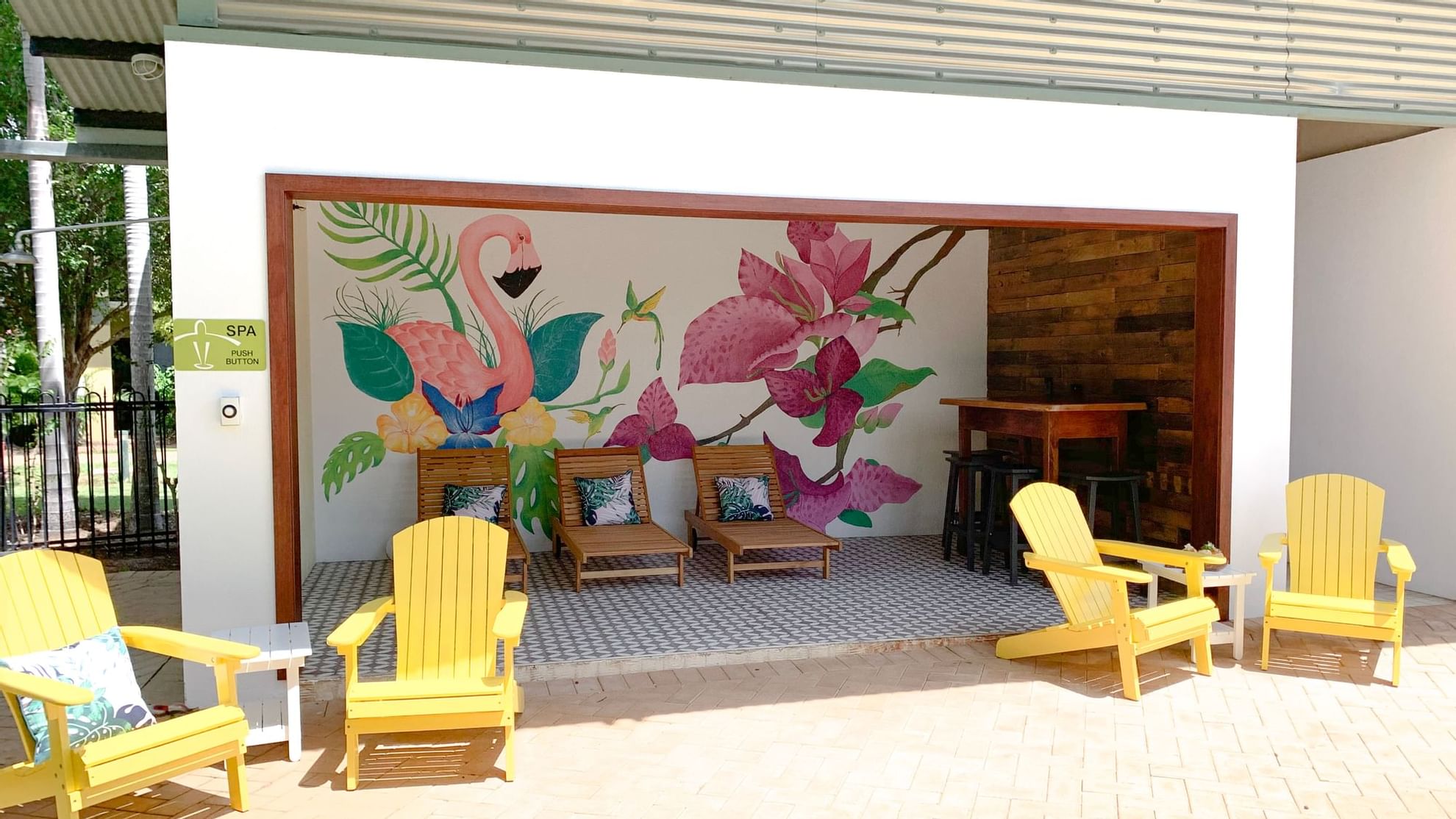 Patio with wooden loungers at Novotel Darwin Airport