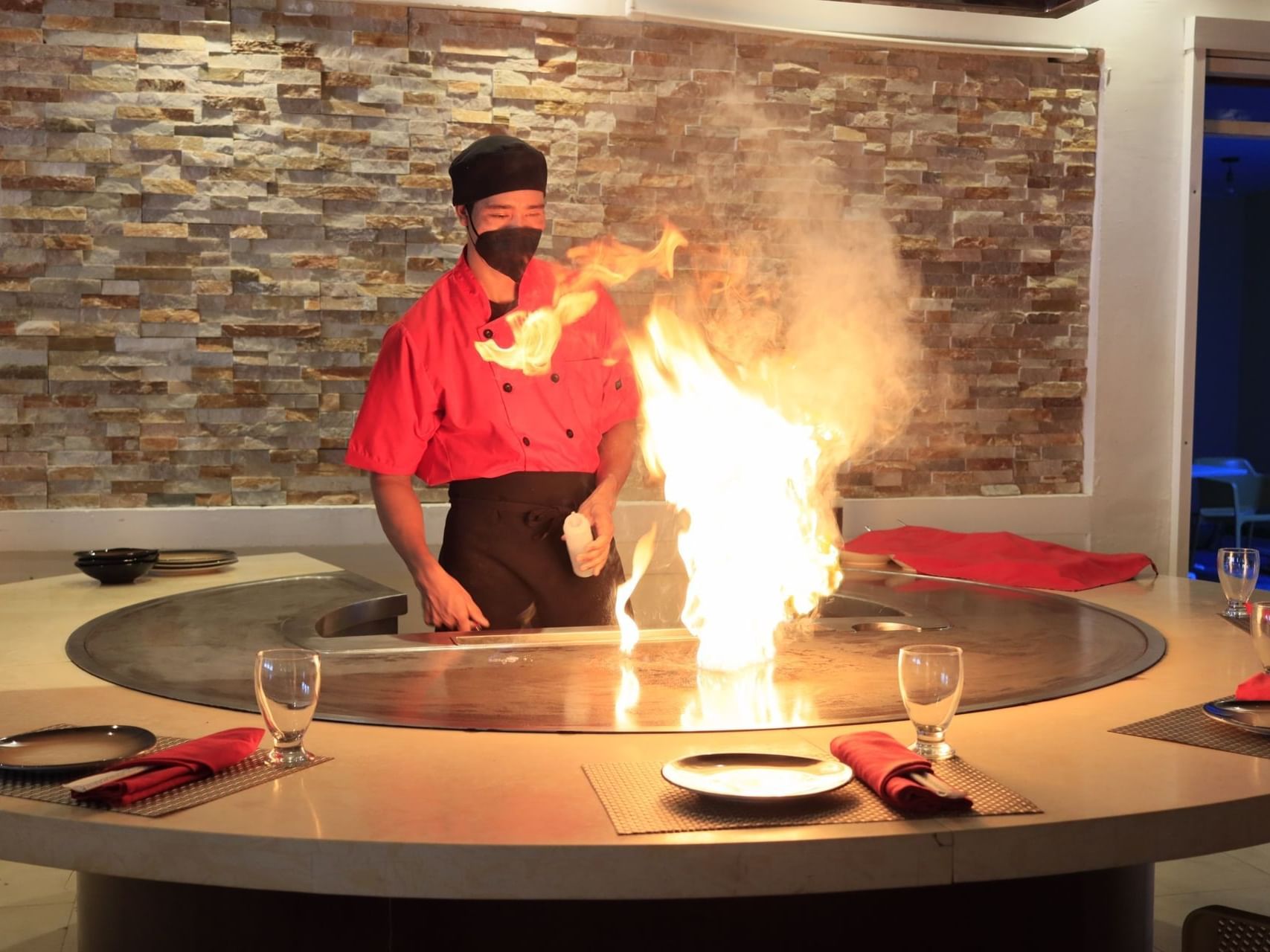 Chef by the table in Teppanyaki at Playa Blanca Beach Resort