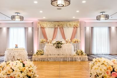Floral head table décor & dance floor at Best Western Premier