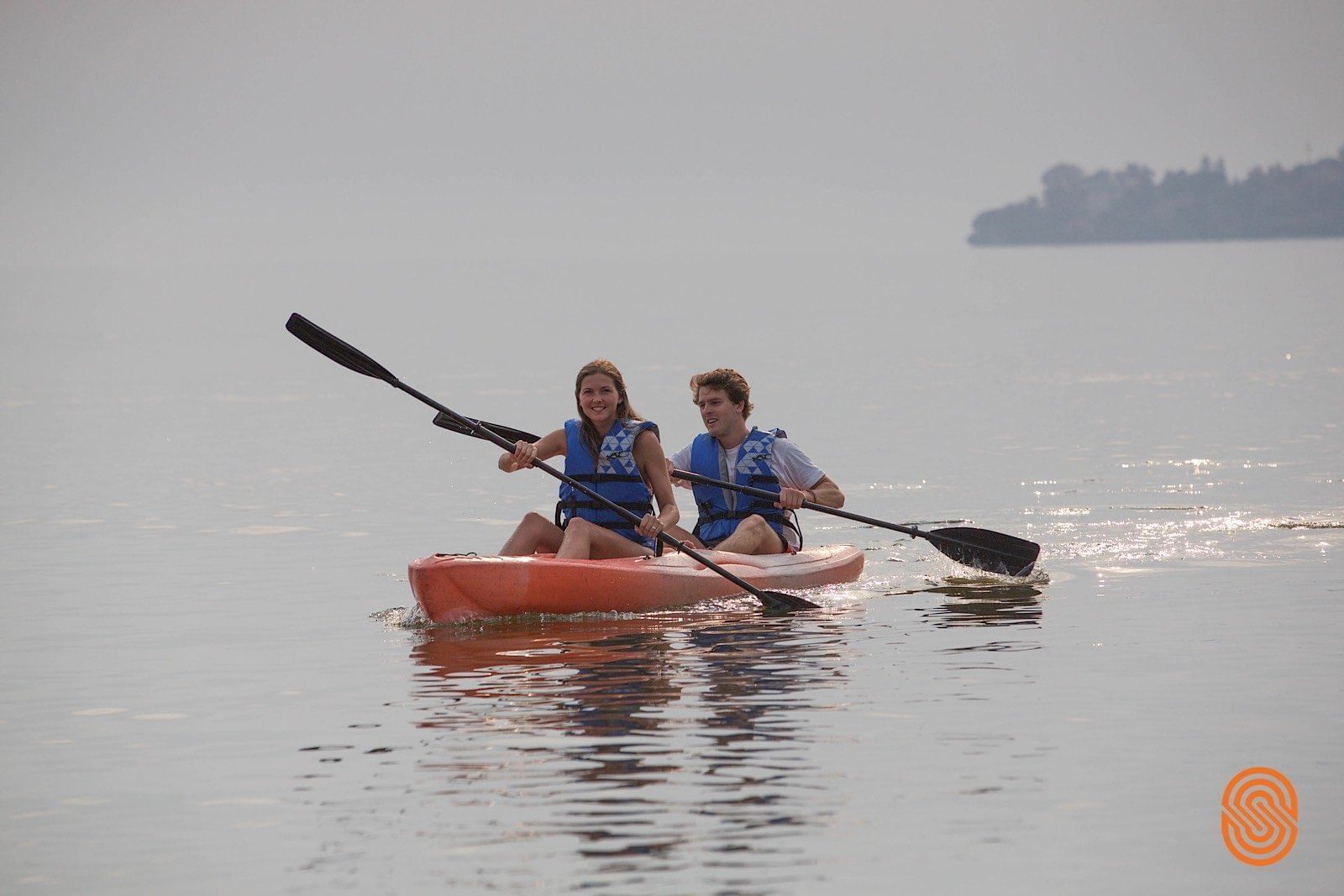 A Couple kayaking near Lake Kivu Serena Hotel