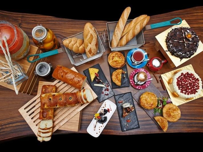 Various bread & desserts served in The Straits Deli at VE Hotel & Residence