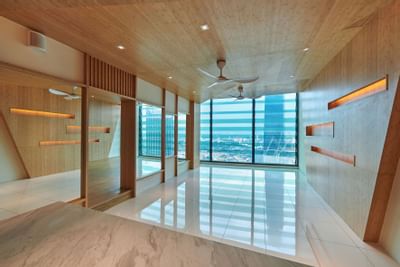 Hallway with city view window at Tribeca Serviced Suites