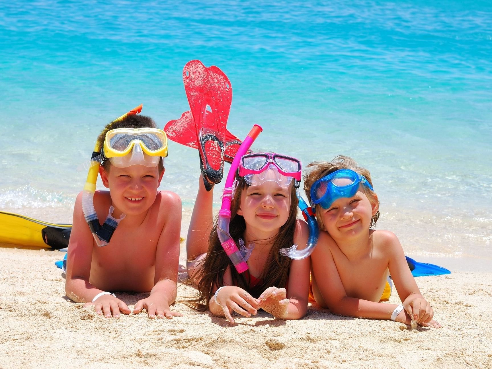 Kids posing in snorkeling fits at Daydream Island Resort