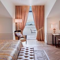 LARGE BED, AND DESK IN SUPERIOR VERSACE ROOM AT PALAZZO VERSACE