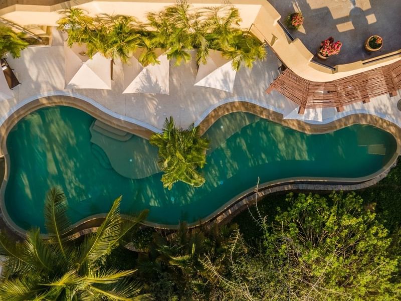 Overhead view of the outdoor pool at Celeste Beach CC Hotel