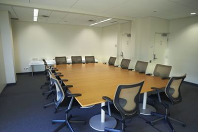 Boardroom set up with a refreshment table in a meeting room at the Schulich School of Business.