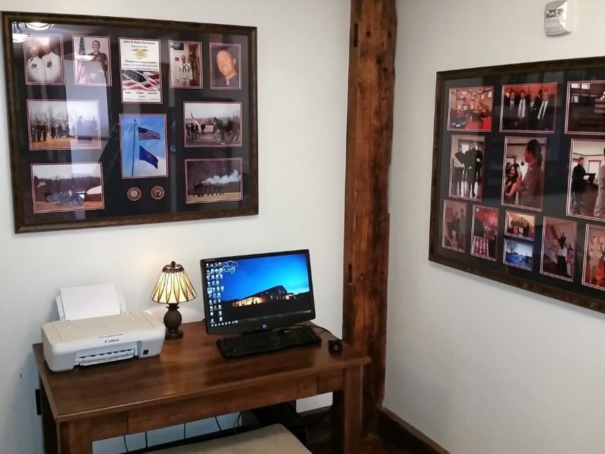 desk with laptop and printer