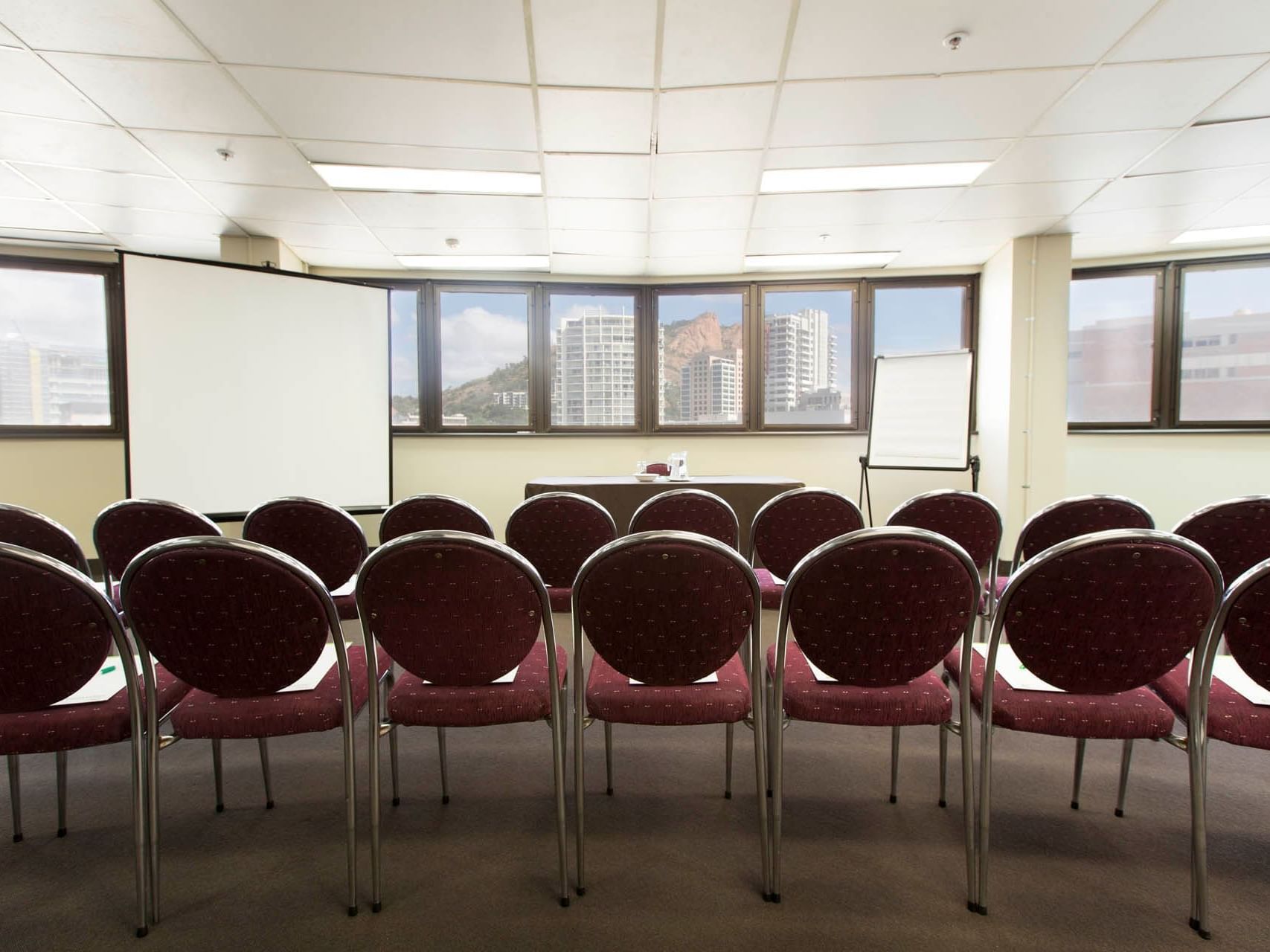 Classroom set-up in Castle Hill meeting room at Hotel Grand Chancellor Townsville