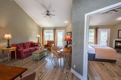 Deluxe Suite with view of master bedroom and living room