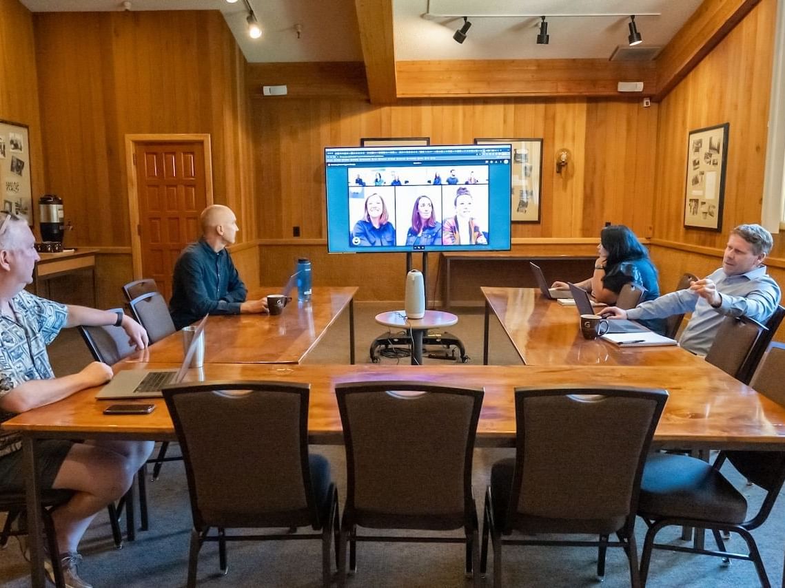 Hybrid meeting taking place in Alumni Room