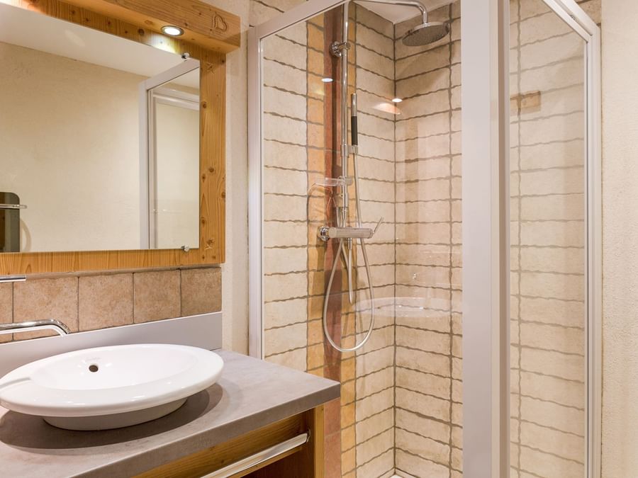 Bathroom vanity in bedrooms at Chalet-Hotel Le Beausoleil