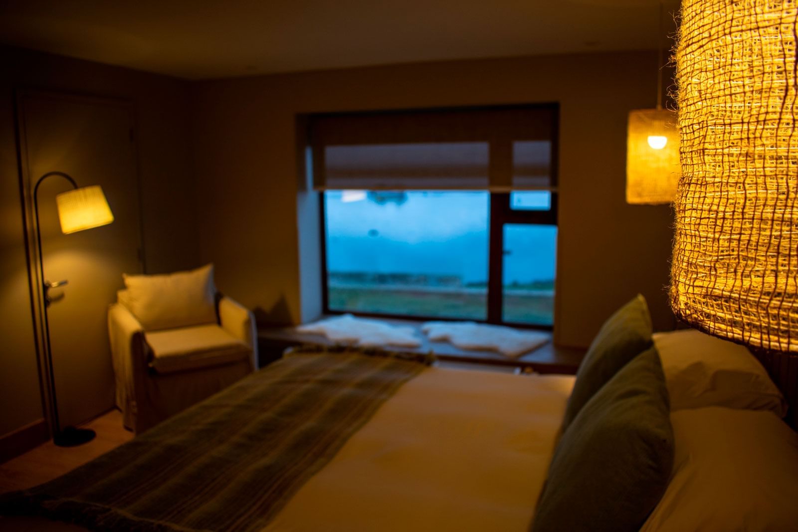 Junior Suite Room bedroom with kingbed at NOI Indigo Patagonia