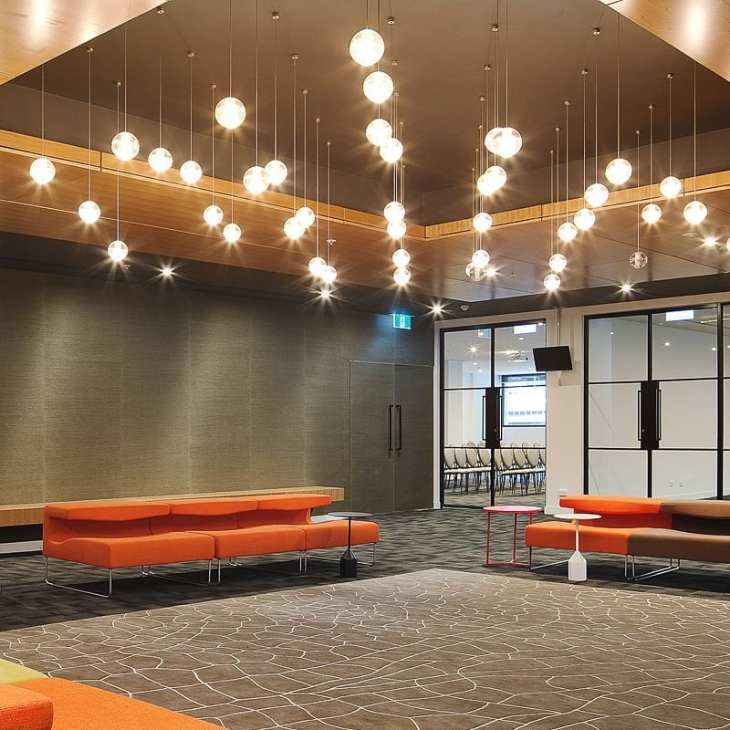 Ceiling lights & lounge in Pre Function Area at Jasper Hotel