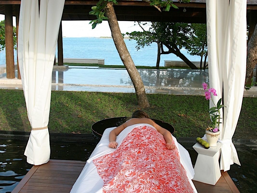 Lady at an outdoor spa treatment at Casa Colonial Beach & Spa