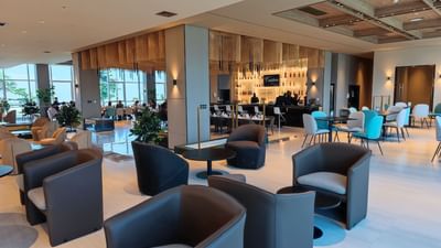 Lounge bar space with comfy chairs at Pegasus Hotel Guyana