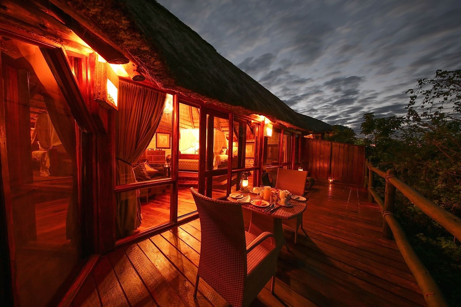 Dinner served in a room balcony at Serena Mivumo River Lodge