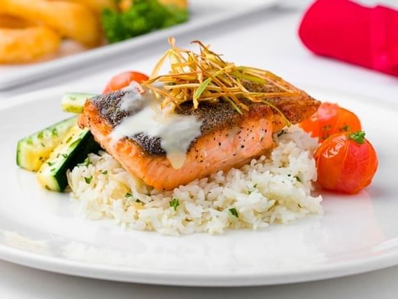 Plate with salmon, rice and vegetables at Mission Inn Riverside