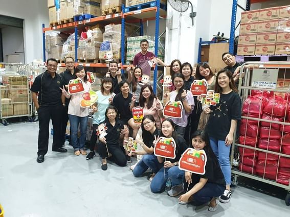 A group of people volunteering at Food from the Heart at Park Hotel Group