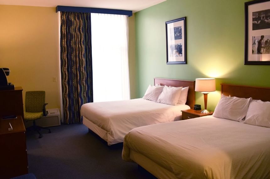 Interior of a room with twin beds at UMass Lowell Inn 