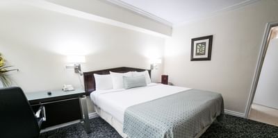 bed with lights and desk
