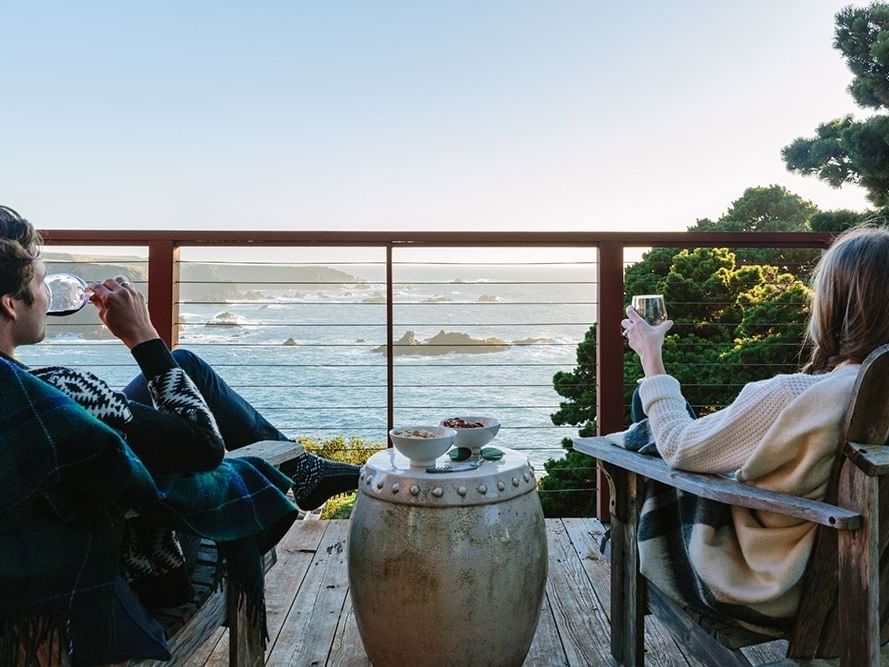 Couple enjoying the views on a balcony at Heritage House Resort