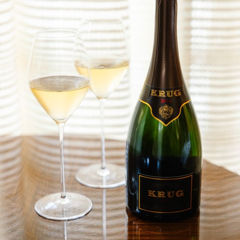 Krug vintage label champagne and full glasses