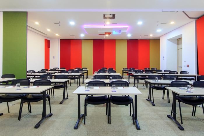 Classroom-type table set-up of a meeting room at 3C Hotels