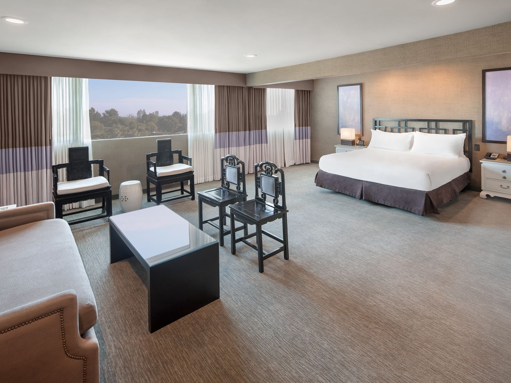Double bed in luxe sunset vista suite at Luxe Sunset Boulevard