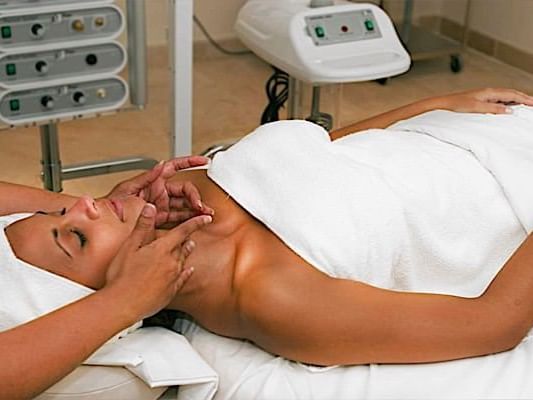 Lady getting a facial in the Spa at Casa Colonial Beach and Spa